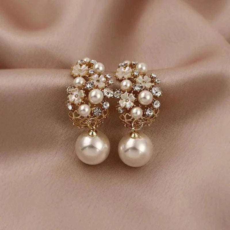 Elegant earrings with flower-shaped beads | Gold