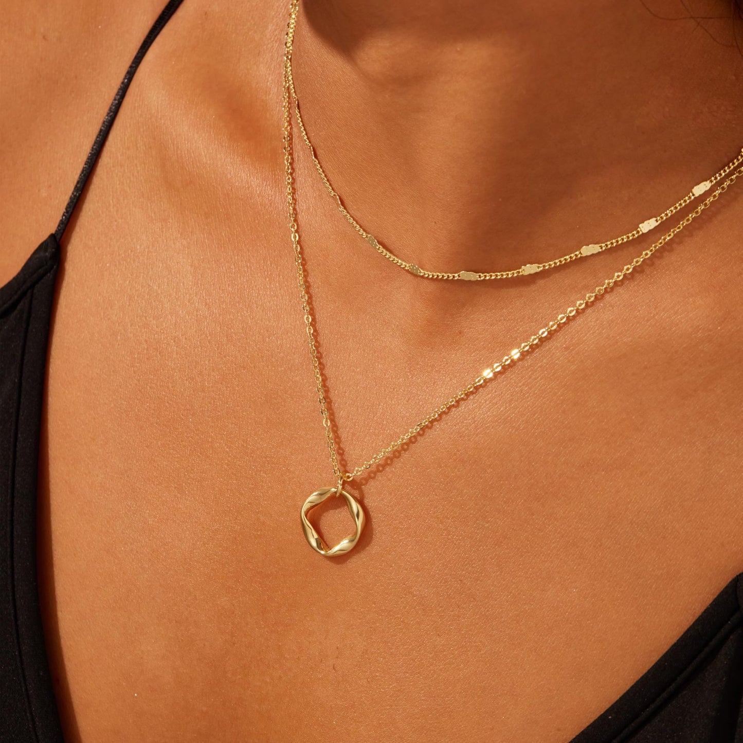 Gelaagde ketting met cirkelbedel